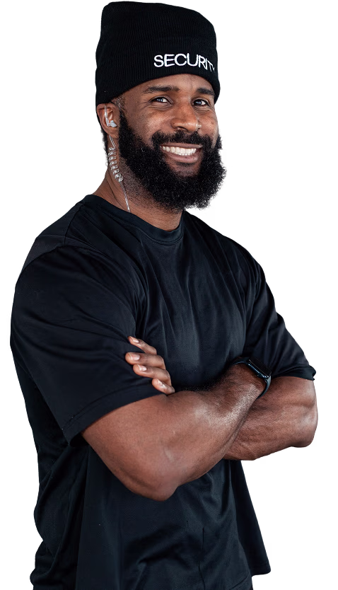 Lavres security professional in branded SECURITY beanie, arms crossed and smiling
